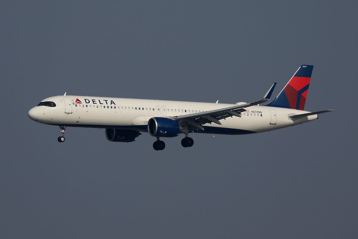 A Delta Airlines Airbus A321-271NX aircraft approaches Los Angeles International Airport (LAX) for a landing from Orlando on January 4, 2025 in Los Angeles, California.  (Photo by Kevin Carter/Getty Images)