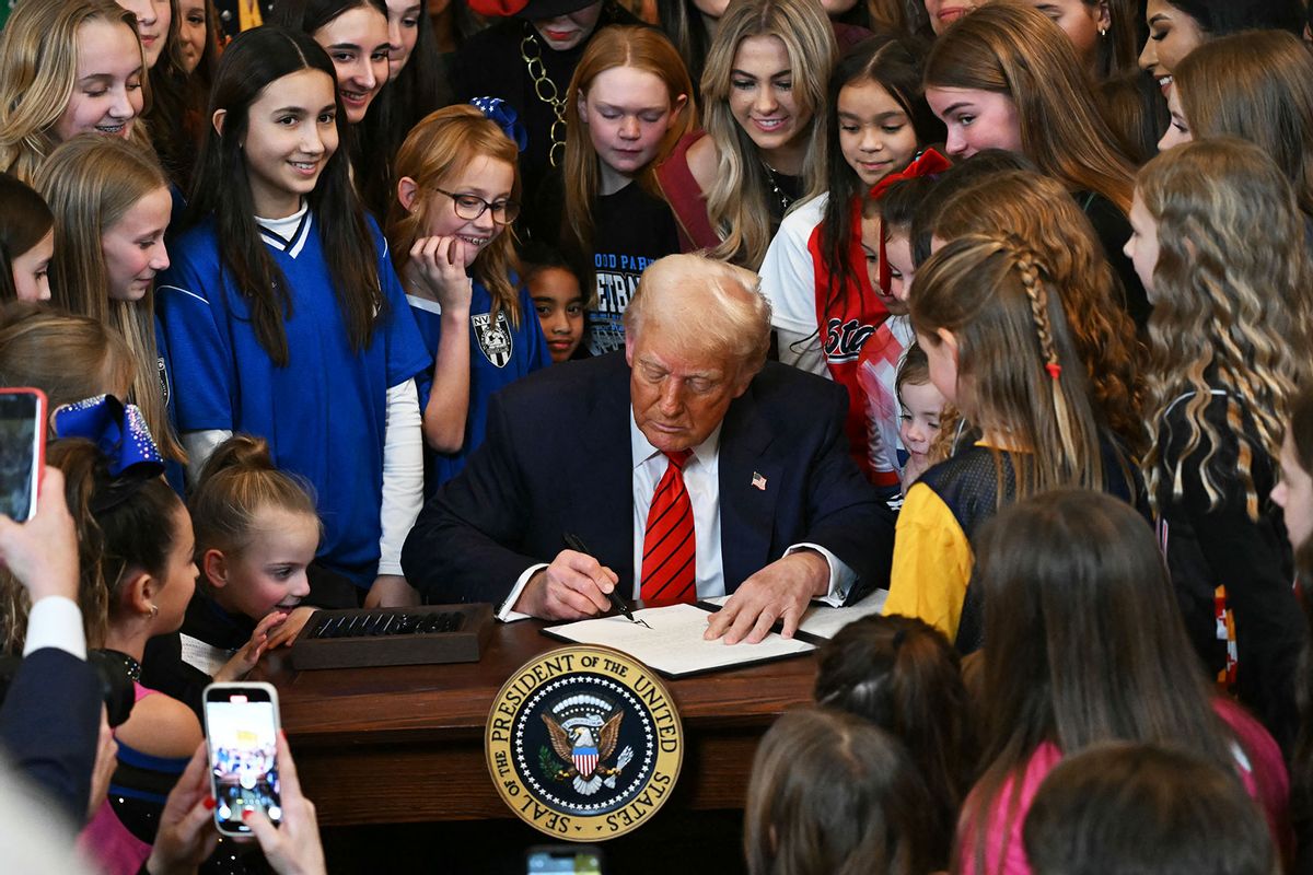 US President Donald Trump signs the No Men in Women's Sports Executive Order into law in the East Room of the White House in Washington, DC, on February 5, 2025. (ANDREW CABALLERO-REYNOLDS/AFP via Getty Images)