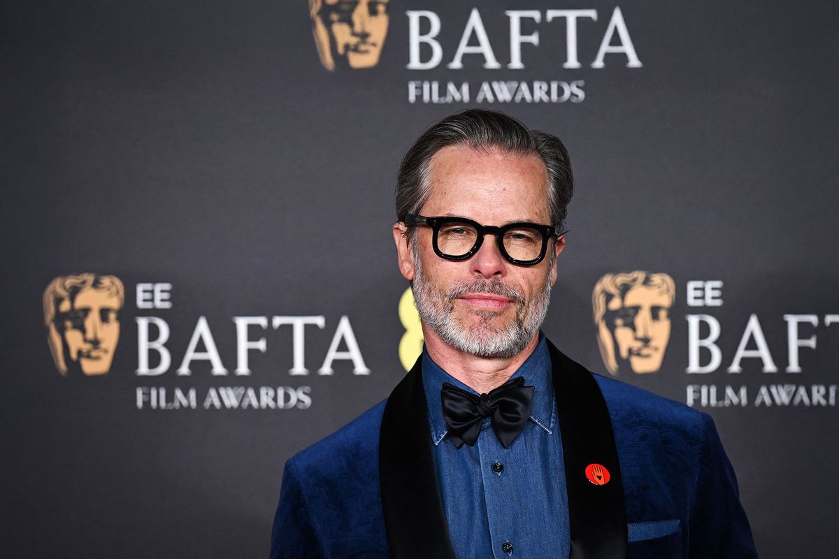 Australian actor Guy Pearce poses on the red carpet upon arrival at the BAFTA British Academy Film Awards at the Royal Festival Hall, Southbank Centre, in London, on February 16, 2025. (BEN STANSALL/AFP via Getty Images)