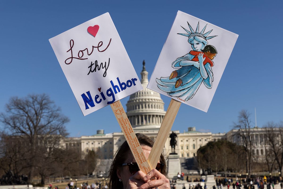 A protester holds a sign during the rally against the Donald Trump administration during ''Not My President's Day'' protests at the Capitol Reflecting Pool in Washington, DC, USA, on February 17, 2025. (Aashish Kiphayet/NurPhoto via Getty Images)
