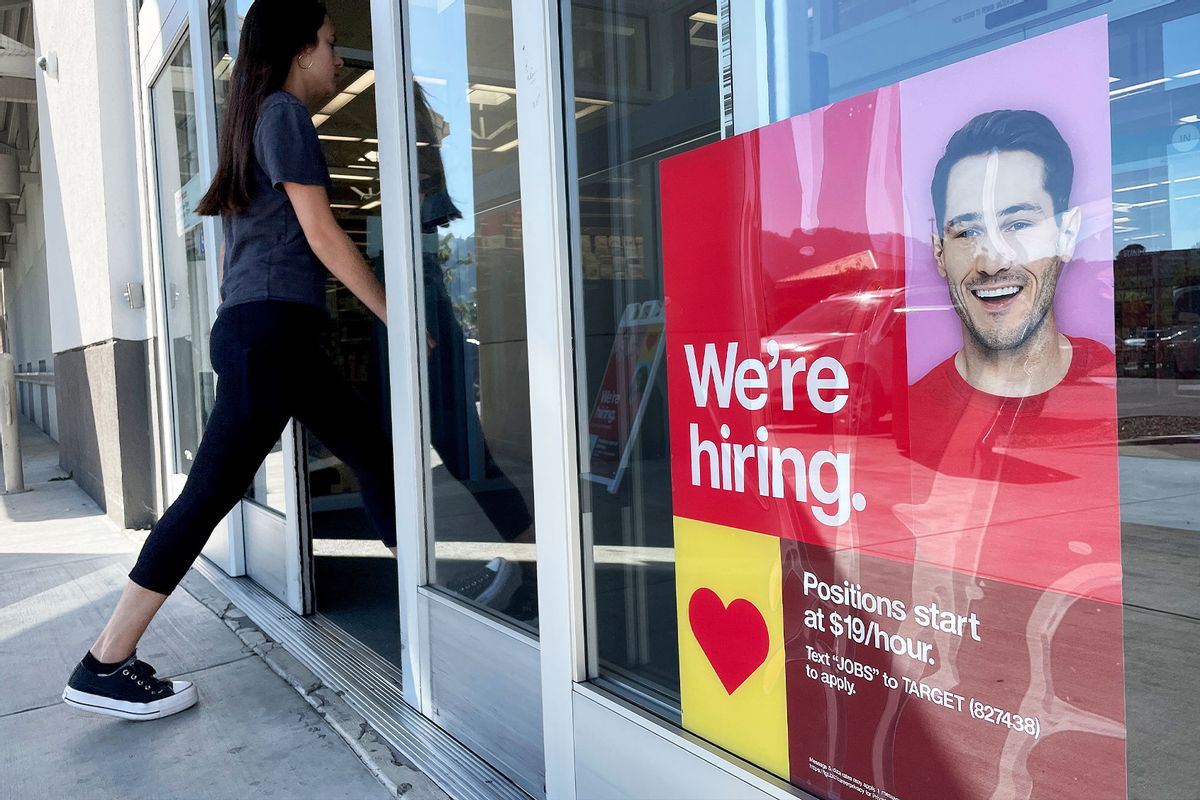 A customer walks by a now hiring sign posted in front of Target store on November 03, 2023 in Sausalito, California.  (Justin Sullivan/Getty Images)