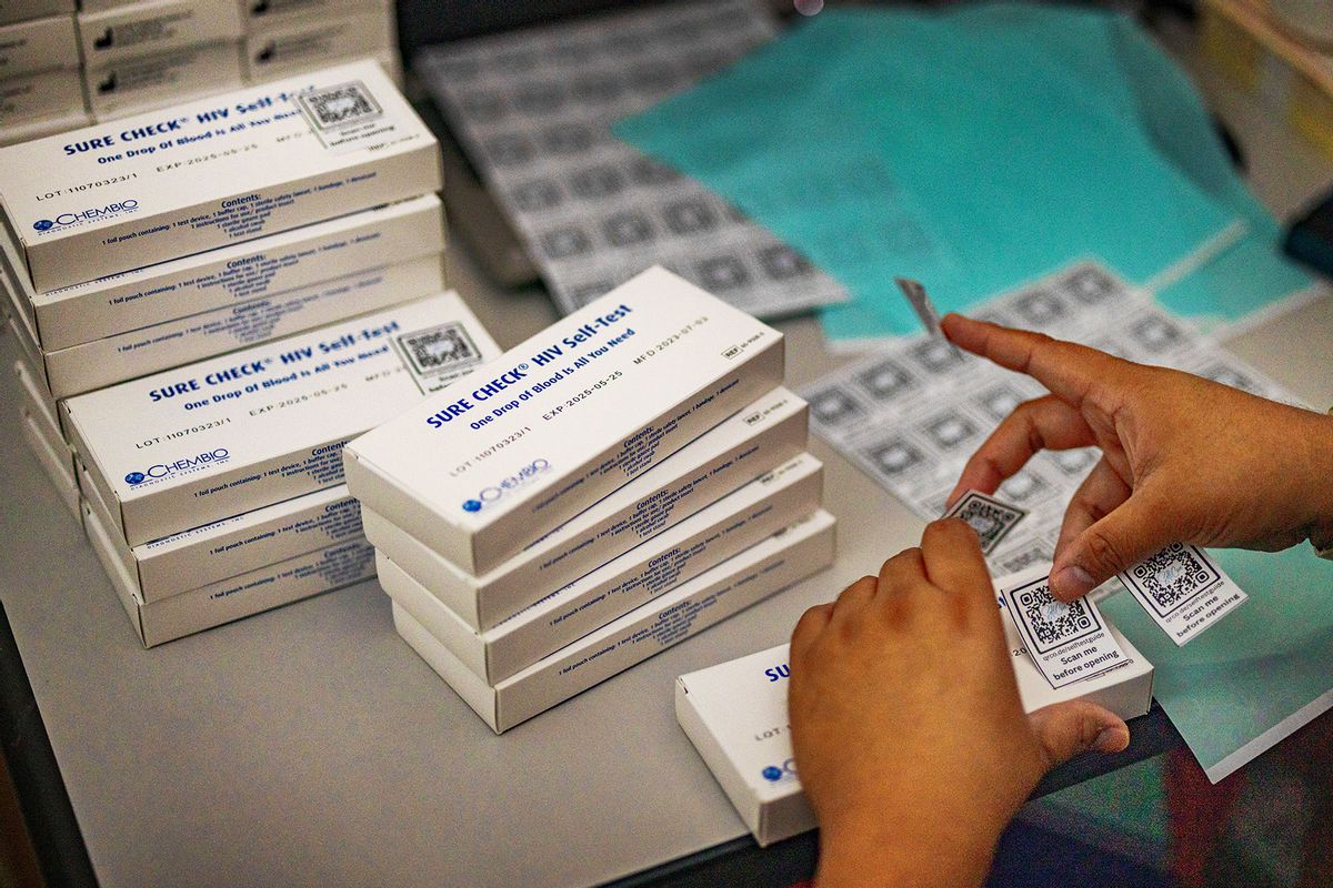 A pharmacist packs HIV self-test kits at a community center operated by LoveYourself, a nonprofit impacted by the Trump administration's freeze on foreign aid, on February 19, 2025 in Mandaluyong, Metro Manila, Philippines. (Ezra Acayan/Getty Images)