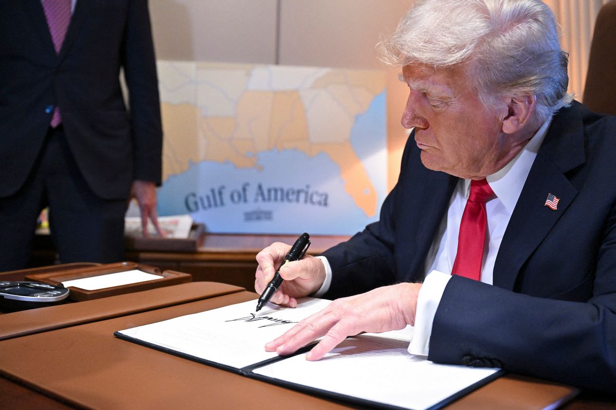 US President Donald Trump signs a proclamation renaming the Gulf of Mexico as the Gulf of America aboard Air Force One, enroute to New Orleans, Louisiana on Febrary 09, 2025.  (Photo by Roberto Schmidt/Getty Images)