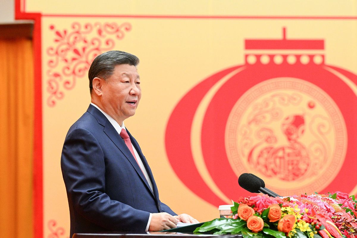 Chinese President Xi Jinping, also general secretary of the Communist Party of China CPC Central Committee and chairman of the Central Military Commission, delivers a speech at a high-level reception to ring in the Chinese New Year at the Great Hall of the People in Beijing, capital of China, Jan. 27, 2025. (Li Xueren/Xinhua via Getty Images)