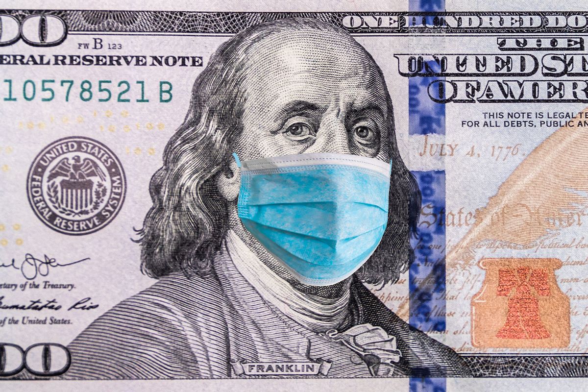 100 dollar banknote with medical mask (Getty Images/Anton Petrus)