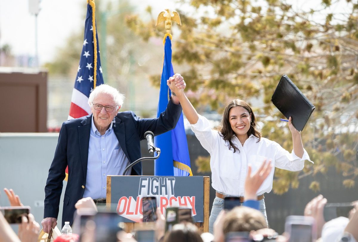 Sen. Bernie Sanders, I-Vt., left, joins Rep. Alexandria Ocasio-Cortez, D-N.Y., on stage before speaking at Fighting Oligarchy: Where We Go From Here rally Thursday, March 20, 2025, in North Las Vegas. (Ronda Churchill for The Washington Post via Getty Images)