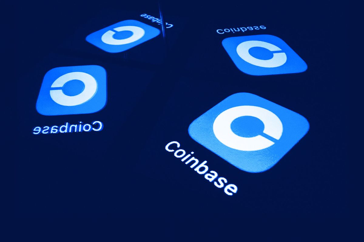 This photograph shows screens displaying the logo of the application Coinbase a platform for buying, selling and trading cryptocurrency, in Toulouse, southern France, on January 15, 2025. (LIONEL BONAVENTURE/AFP via Getty Images)