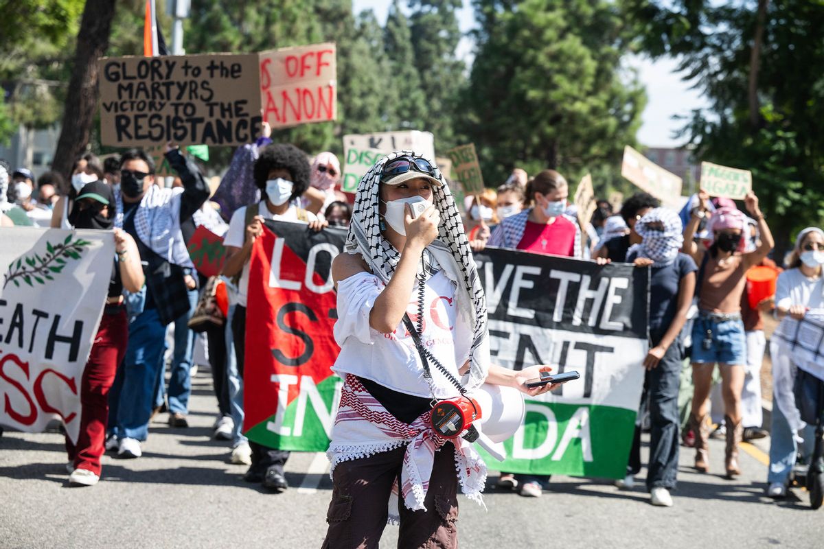 On the anniversary of the Hamas attack on Israel, USC students walk out of class and march around their campus in support of Palestinians and the divest movement on Monday, October 7, 2024 in Los Angeles. (Sarah Reingewirtz, Los Angeles Daily News/SCNG/Getty Images)