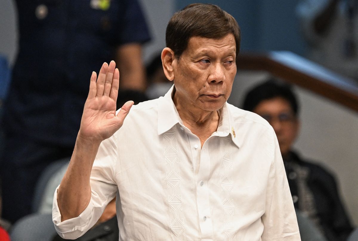 Former Philippine president Rodrigo Duterte takes an oath as he attends a senate probe on the drug war during his administration, in Manila on October 28, 2024. (Photo by JAM STA ROSA/AFP via Getty Images)