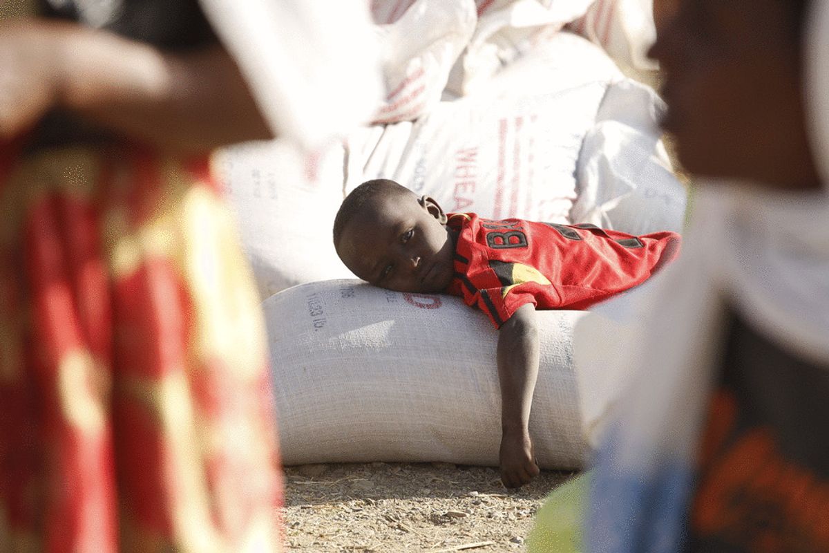 Tigray people in northern Ethiopia receive food aid distributed by United States Agency for International Development (USAID) on March 8, 2021. (Minasse Wondimu Hailu/Anadolu Agency via Getty Images)