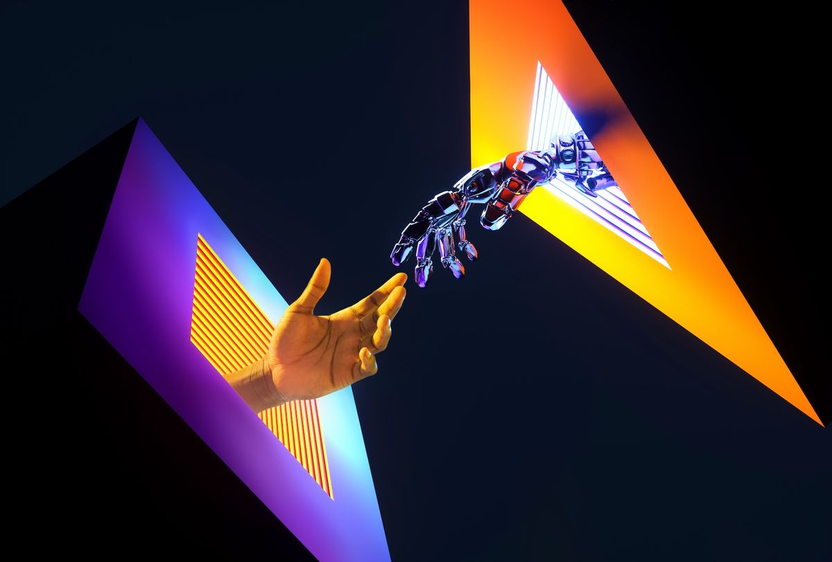 Human hand touching robotic hand. (Getty Images / Andriy Onufriyenko)