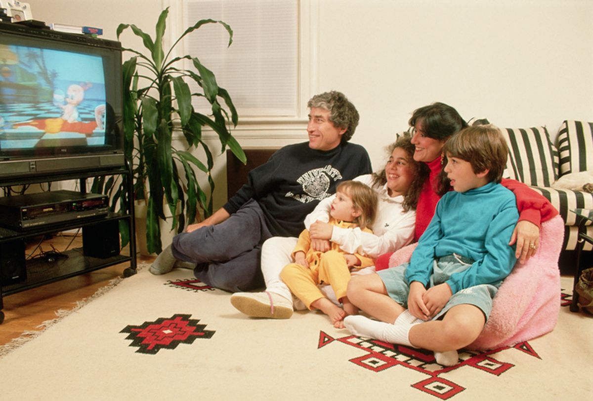 Families used to gather around the single tv set in the house to catch up on "Must See TV." Now, it's mostly just individuals streaming alone. Is that okay?  (Richard T. Nowitz/Getty Images)