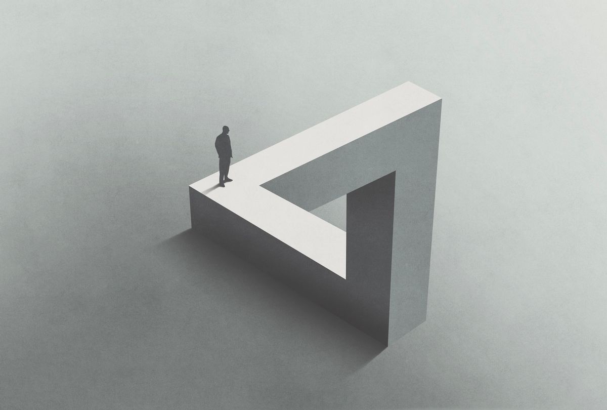 Man walking on Penrose triangle. (Getty Images / francescoch)