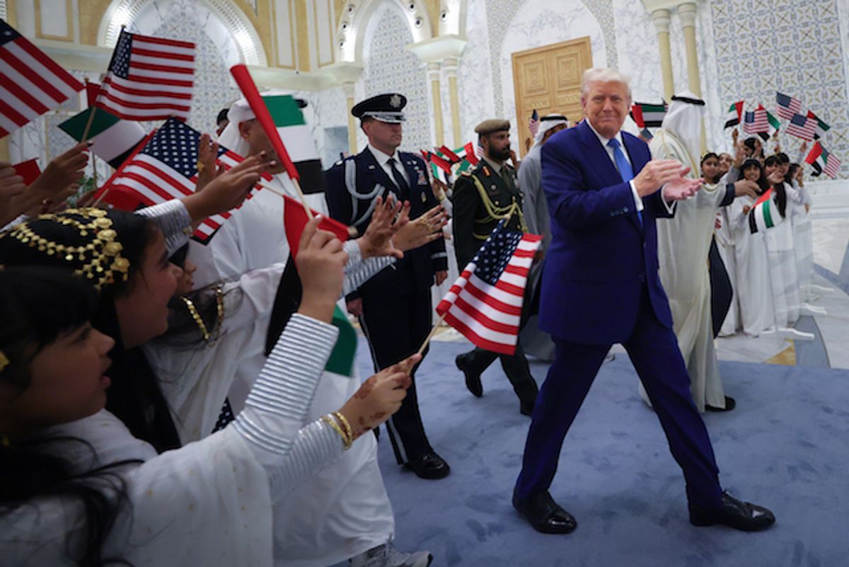 President Donald J. Trump is greeted by young girls as he arrives for an official arrival ceremony at Qasr al Watan (Palace of the Nation) May 15, 2025, in Abu Dhabi, United Arab Emirates.  (Win McNamee/Getty Images)
