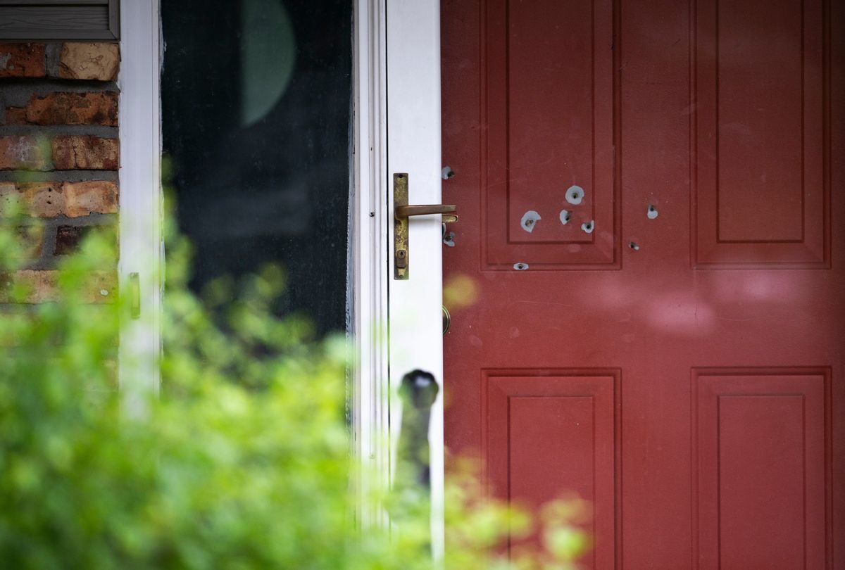 Bullet holes are seen in the door outside the home of DFL State Sen. John Hoffman on June 15, 2025 in Champlin, Minnesota. (Stephen Maturen/Getty Images)