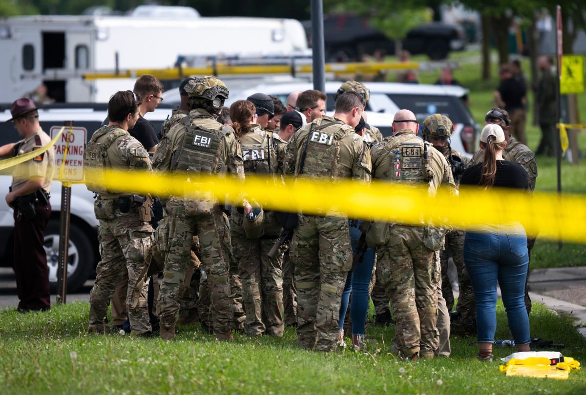 FBI agents search for suspect Vance Boelter on June 15, 2025 in Green Isle, Minnesota.  (Stephen Maturen/Getty Images)