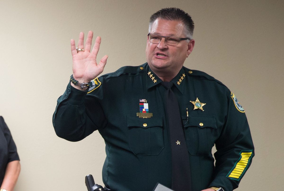 Brevard County Sheriff Wayne Ivey raises his right hand to swear in several officers on November 1, 2017 in Titusville, Florida.  (Willie J. Allen Jr. for The Washington Post via Getty Images)