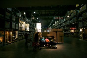 Shoppers rest in a branch of the Swedish retail store IKEA in the Israeli city of Netanya