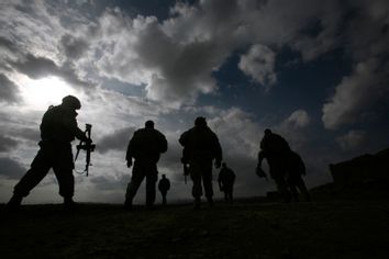 U.S. soldiers from Charlie and Echo Company, 4th Brigade combat team,1-508 parachute infantry Regiment walk back to FOB Shamulzai in Zabul province