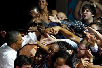 U.S. President Barack Obama fist bumps a supporter