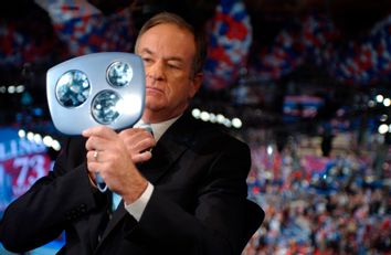 Commentator Bill O Reilly checks himself in mirror before interview at Republican National Convention.