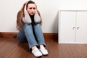 Teenage girl frightened and alone very worried