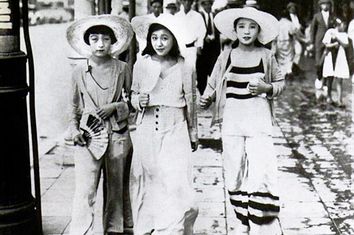 Young moga (modern girls) walk down a Ginza street in 1928 dressed in 'Beach Pyjama Style.'