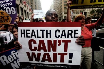 Activists Rally For Health Care Insurance Reform