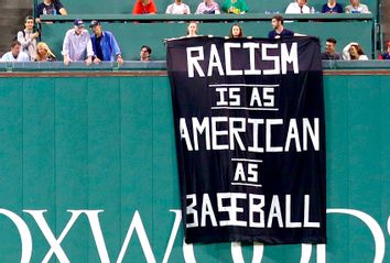 Banner; Racism; Oakland Athletics v Boston Red Sox