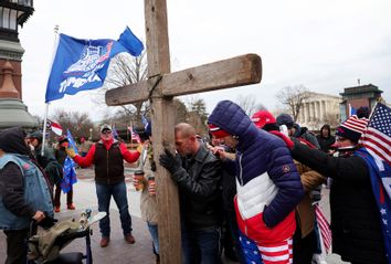 Supporters of U.S. President Donald Trump pray outside the U.S. Capitol January 06, 2021 in Washington, DC. 