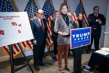 Attorney Sidney Powell speaks during a news conference with Rudy Giuliani, lawyer for U.S. President Donald Trump, about lawsuits contesting the results of the presidential election at the Republican National Committee headquarters in Washington, D.C.