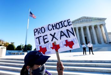 Pro-choice demonstrators protest outside of the US Supreme Court in Washington, DC