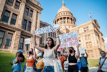 Pro-choice protesters march outside the Texas State Capitol