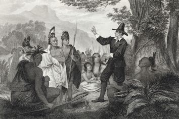 John Eliot, (1604-1690), American Puritan minister and missionary, preaching to the Algonquian Indians.
