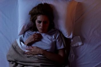 Woman struggling to sleep at night