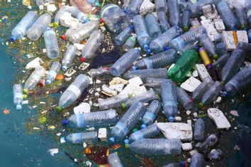 Plastic bottles and polystyrene floating in sea