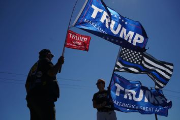 Donald Trump supporters wave flags