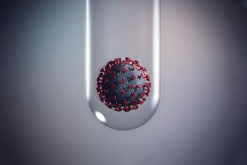 Conceptual image of coronavirus inside a test tube