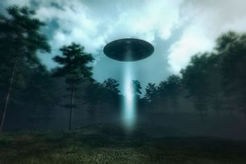 UFO landing in the forest meadow