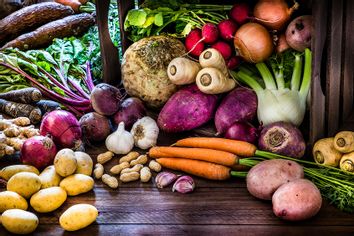 Group of multicolored fresh organic roots, legumes and tubers