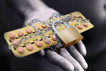 Credit Card Wrapped in Chains and Padlocked --- Image by Â© Royalty-Free/Corbis