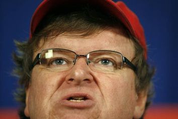 Michael Moore speaks at a news conference in Washington