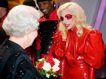 Britain's Queen Elizabeth II meets U.S. singer Lady Gaga following the Royal Variety Performance in Blackpool, England