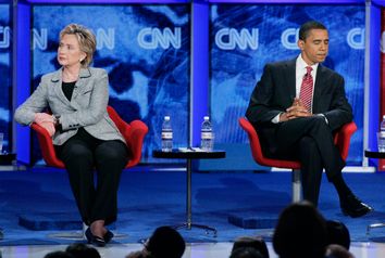 U.S. Senators Clinto and Obama sit onstage during Democratic Party debate at the University of Nevada Las Vegas (UNLV) in Las Vegas