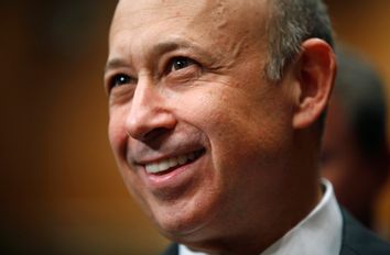 Goldman Sachs CEO Blankfein smiles during testimony before the Senate Homeland Security and Governmental Affairs Investigations Subcommittee hearing on 