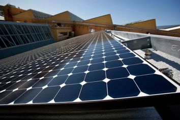 Solar panels sit on the roof of SunPower Corporation in Richmond