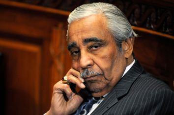 Rangel talks on his mobile phone as he waits for panel to return from break in his ethics hearing before House Adjudicatory subcommittee in Washington