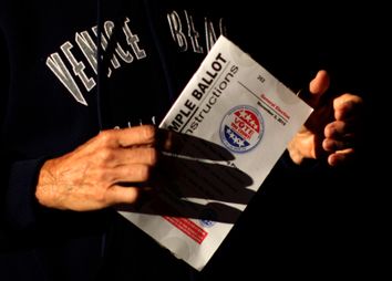 A woman arrives to vote at a polling place on Venice Beach in Los Angeles