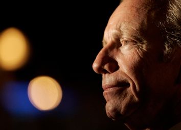 U.S. Senator Joe Lieberman answers a question from a reporter in New Britain