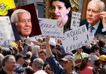 People wave signs at a 